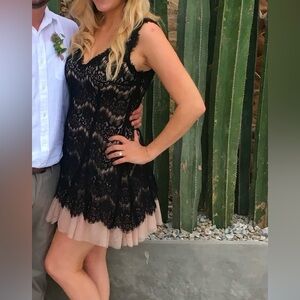 Avery G Evening Short Dress, size 8. Black lace with nude lining and tulle.